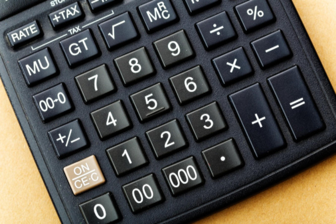 Calculator on desk: Lorenzo & Lorenzo Personal Injury Blog