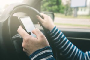 driver using cell phone while driving